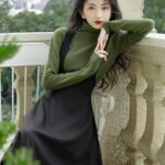 Dark-Academia-Women-in-Green-Sweater-Black-Suspender-Dress-Outfit (3)