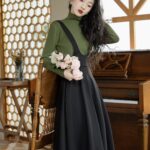 Dark-Academia-Women-in-Green-Sweater-Black-Suspender-Dress-Outfit (4)